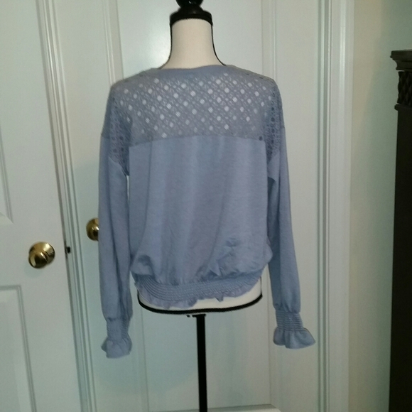 Lace pullover top with ruffle sleeves. - Picture 2 of 3
